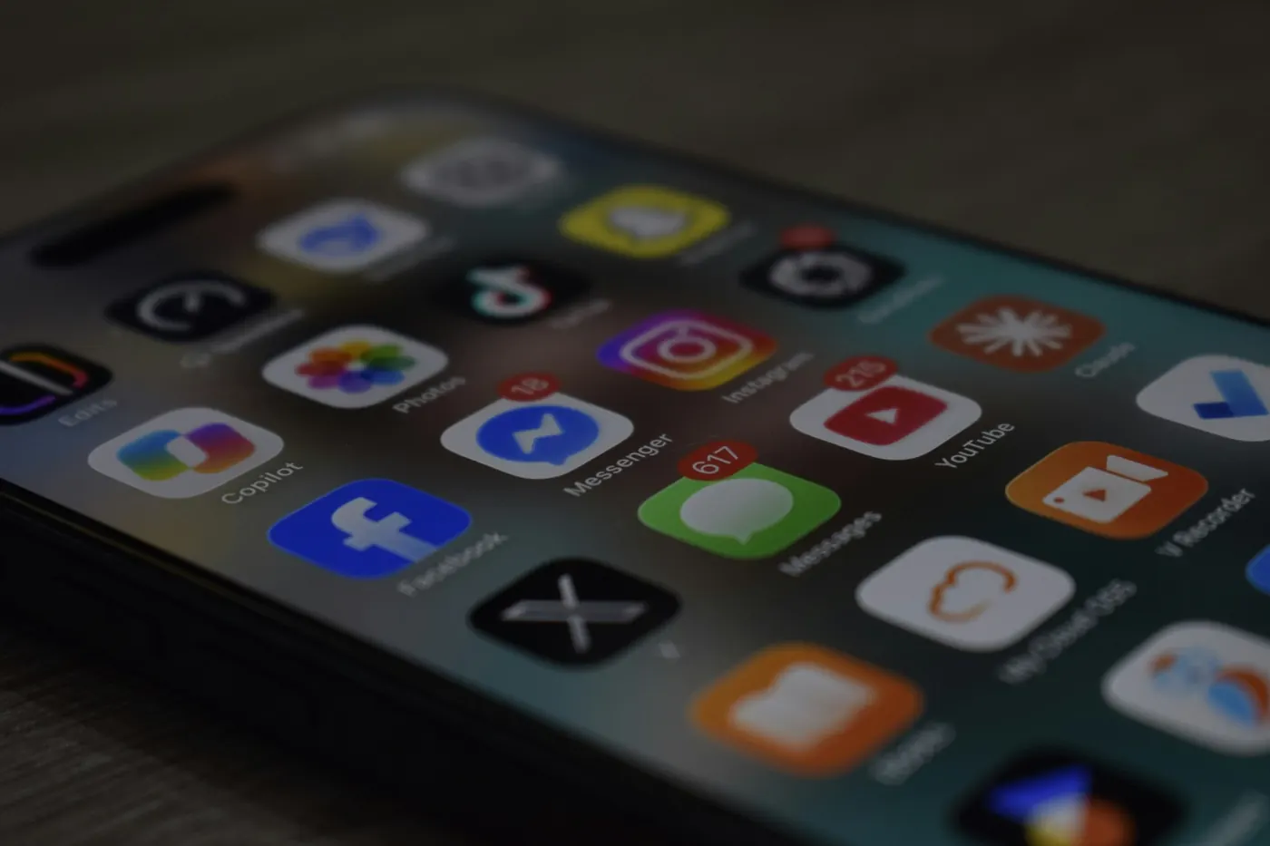 A phone home screen showing social media app icons