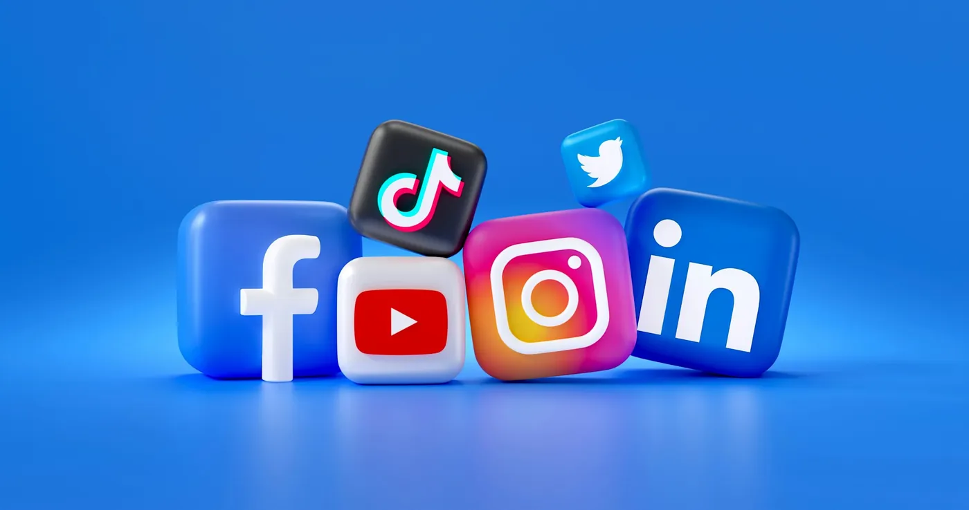 Three-dimensional social media icons on a blue background